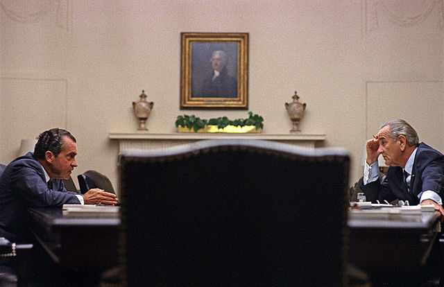 Lyndon Johnson and Richard Nixon at the White House in 1968. Via Wikimedia Commons